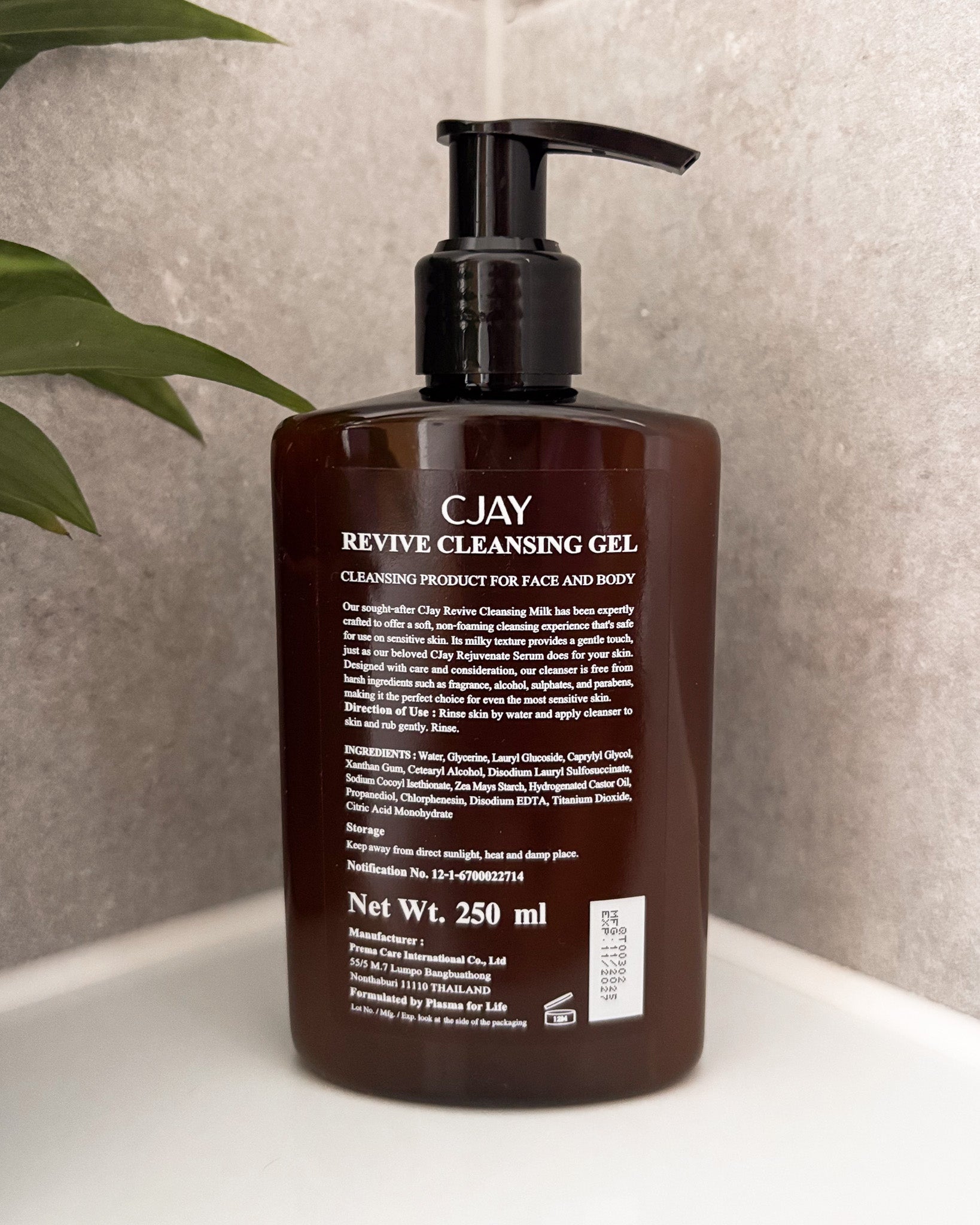 CJAY Revive Cleansing Gel bottle in a bathroom setting 